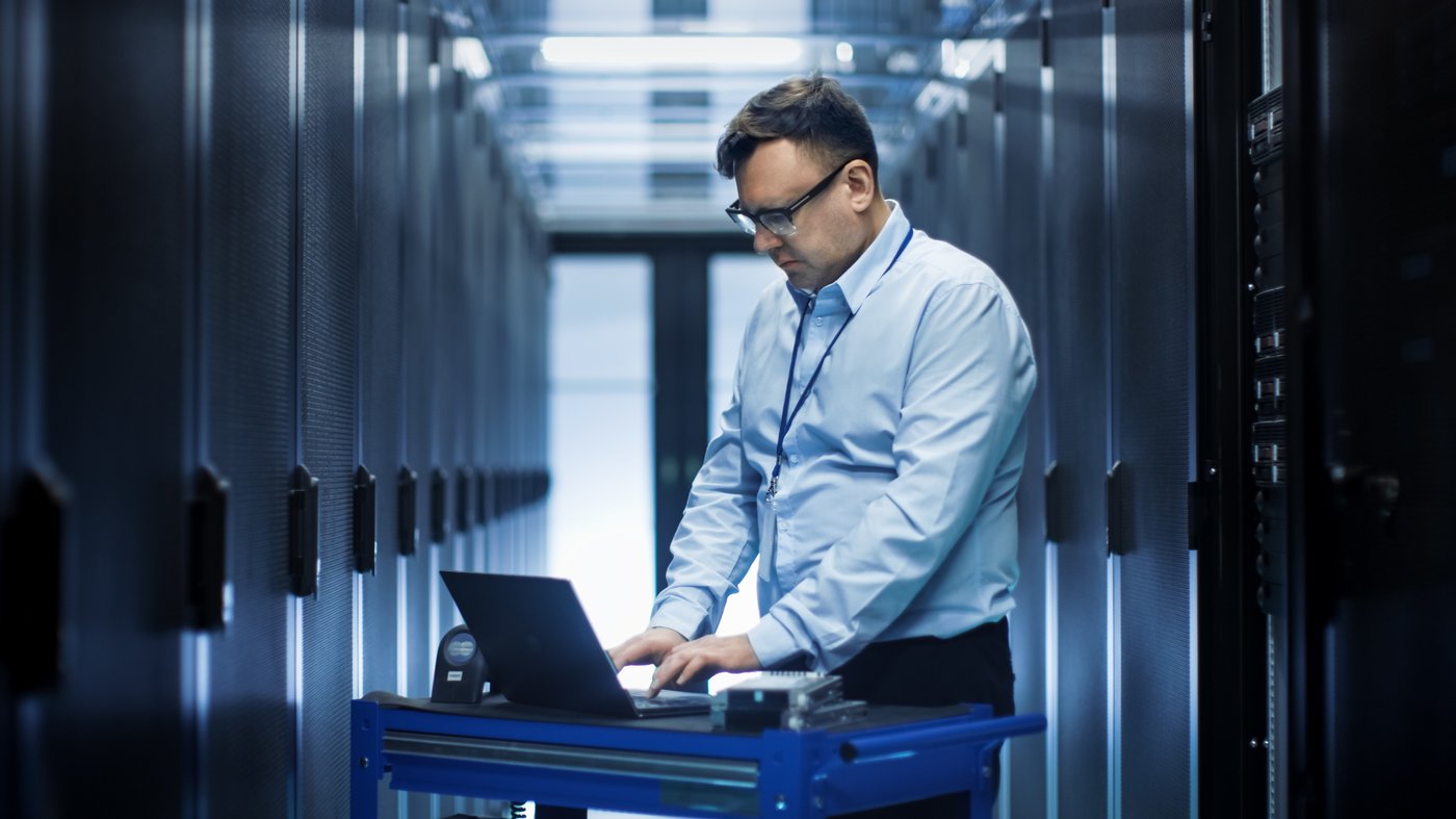 IT Staff Working on Computer Upgrade