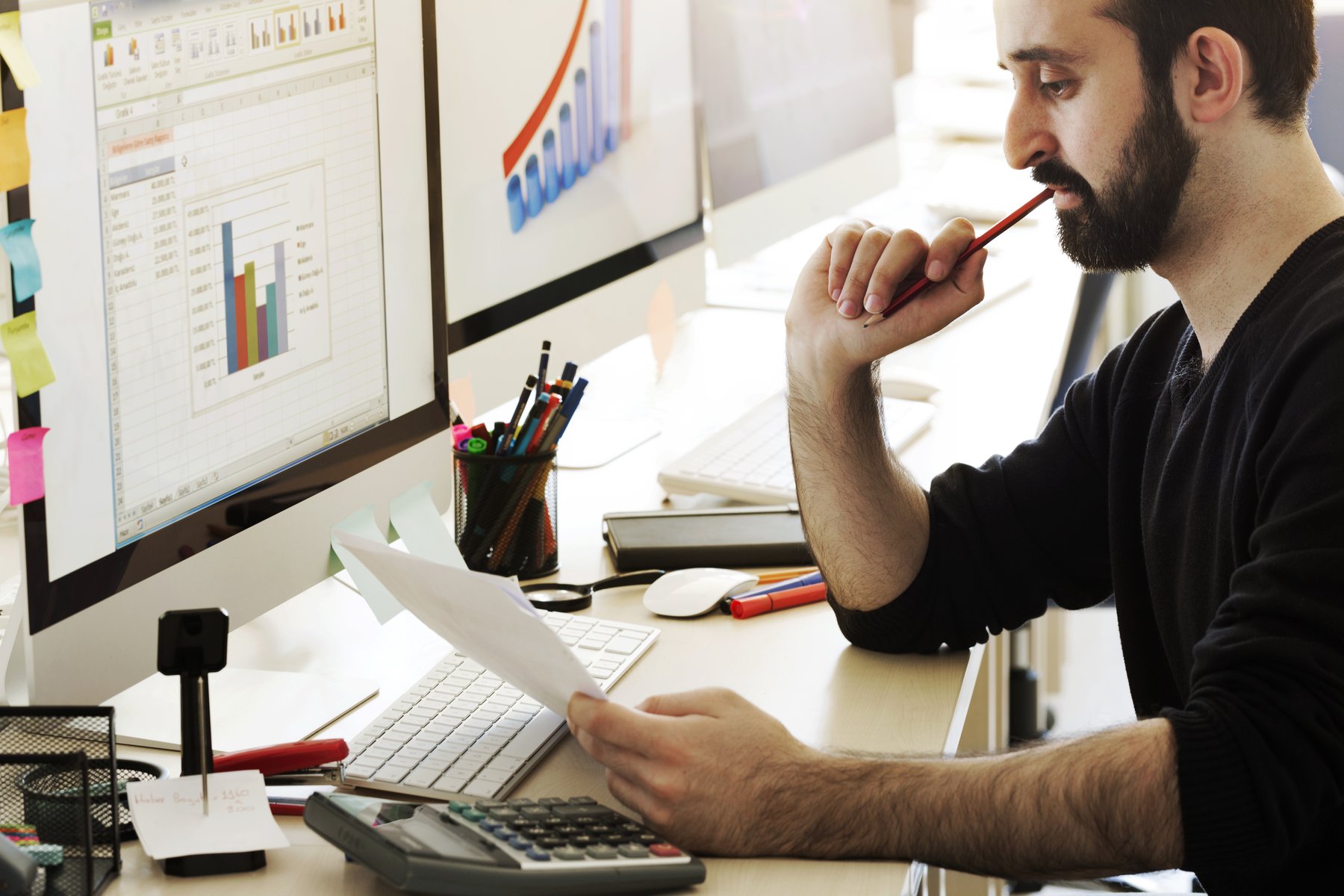 Man Contemplating Office 365 Adoption at Computer