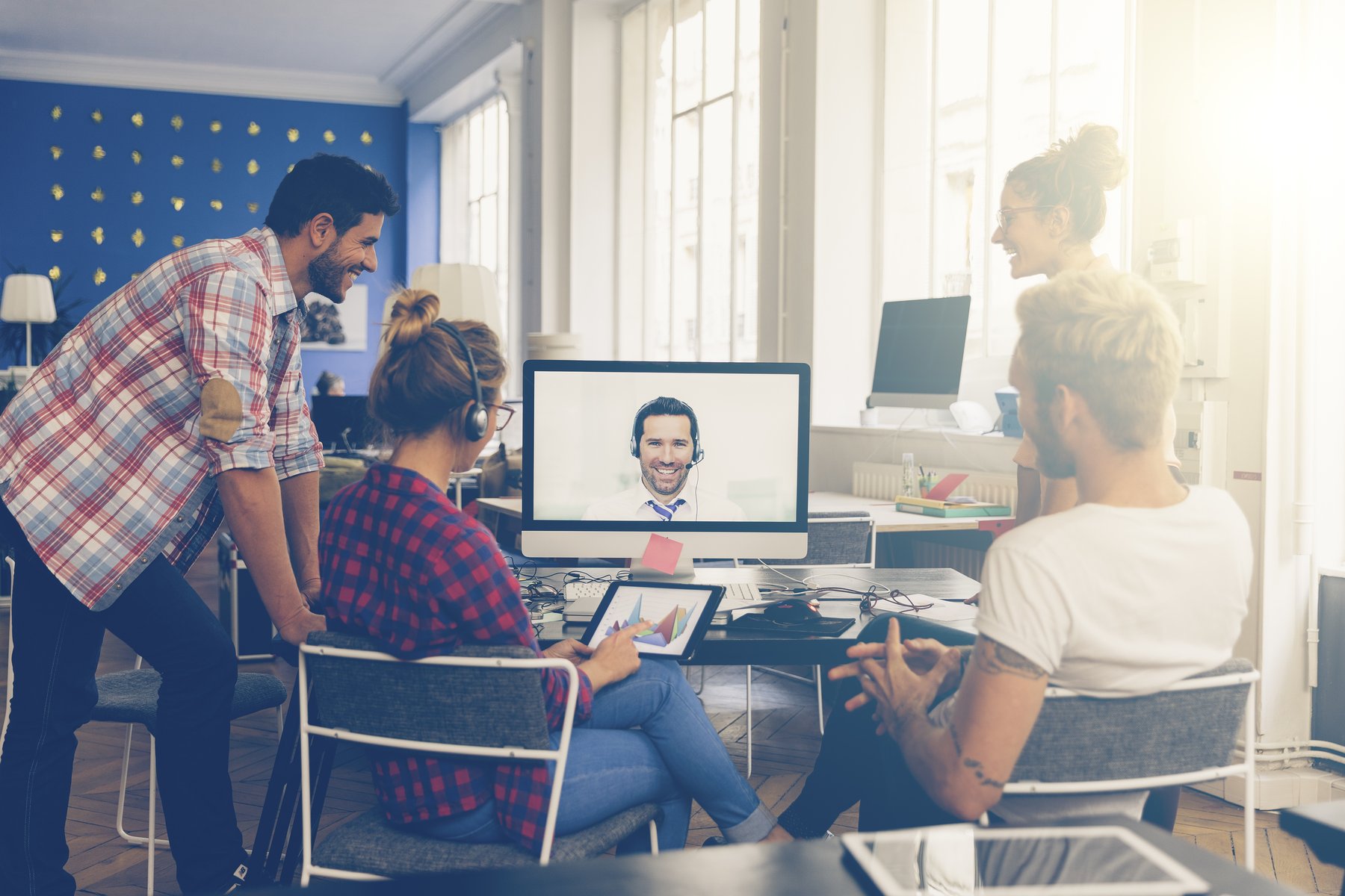 Team using Skype for Video Conferencing