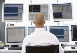 AdobeStock_businessman_multiple_monitors_small.jpg