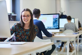 Young businesswoman at computer